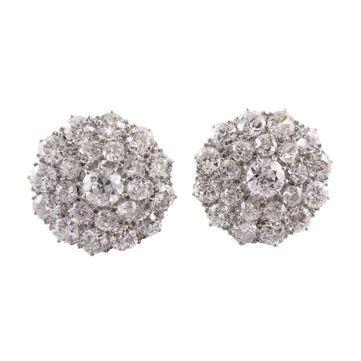 Pair of antique diamond cluster stud earrings, flowerhead panels set with old brilliant cut stones